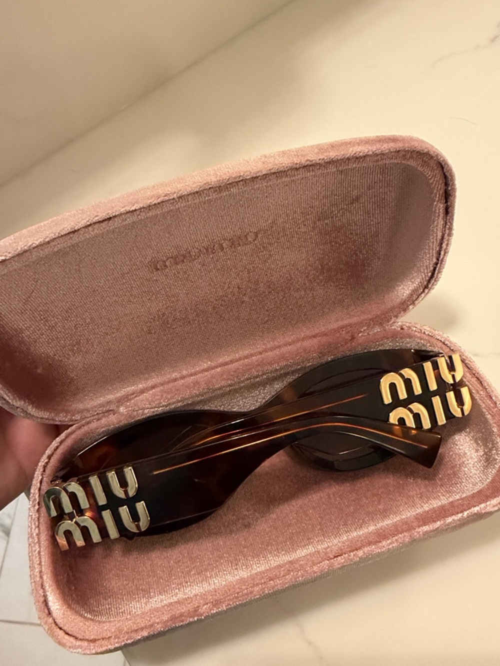 Miu Miu Tortoiseshell Sunglasses with Gold Logo Accents